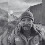 climber of background mountains