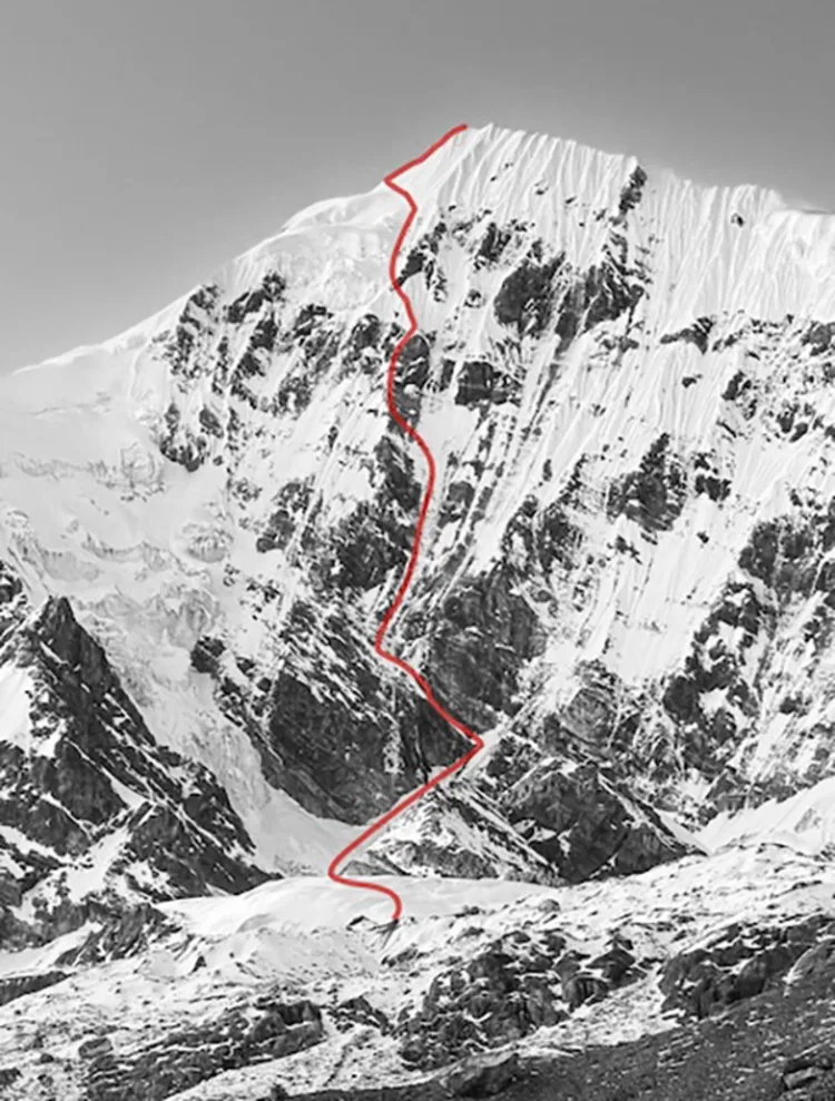 A black-and-white image of a snow-covered mountain with a red line marking a climbing route up its steep slopes.