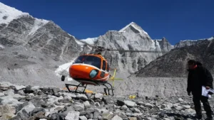 helicopter behind of mountains
